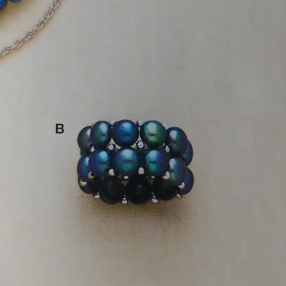 Genuine cultured freshwater peacock pearl ring